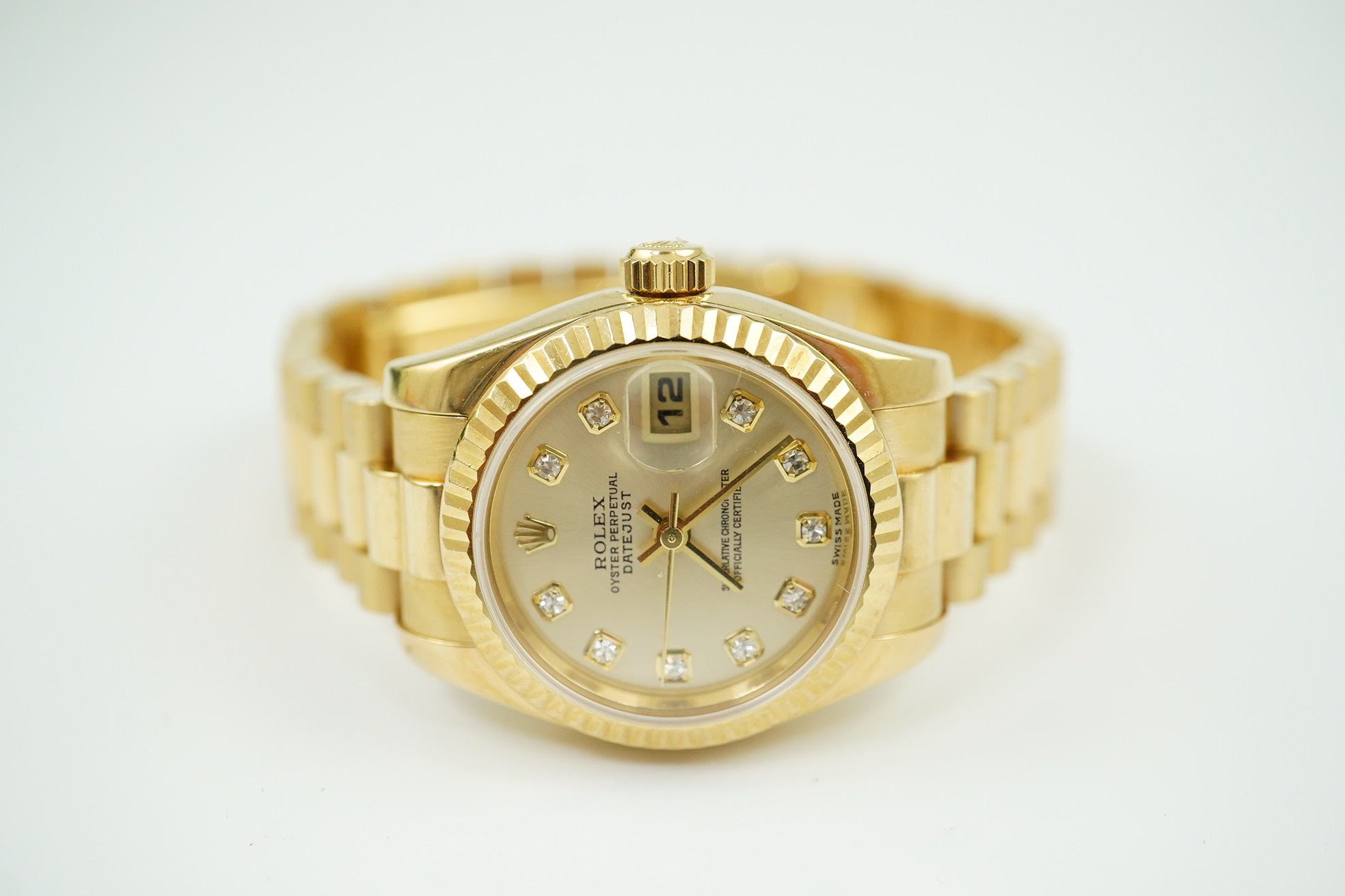 A lady's 2002 18ct gold and diamond set Rolex Oyster Perpetual Datejust wrist watch, on an 18ct gold Rolex bracelet with deployment clasp